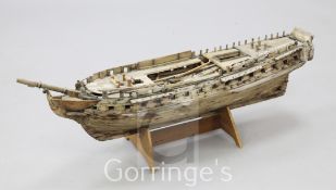 An 18th century wooden model of a thirty two gun Ship of The Line, length 3ft 2in.