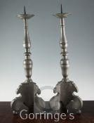 A pair of 19th century German pewter pricket candlesticks, 24in.