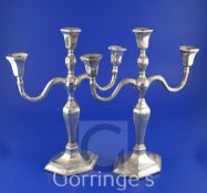 A pair of 20th century Chinese silver two branch, three light candelabra by Wai Kee, Hong Kong, with