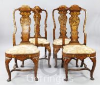 A set of three 18th century Dutch floral marquetry and walnut dining chairs, with solid splats, drop