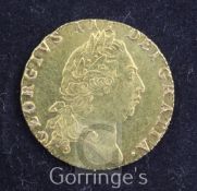 A George III gold spade guinea, 1798, Fifth head, good VF