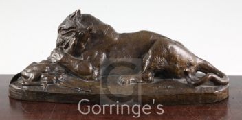 Antoine-Louis Barye (1795-1875) A bronze tiger devouring a gazelle, signed, on naturalistic integral