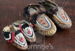 Two pairs of 19th century Native American child's moccasins, with beadwork decoration, 7.5in. and