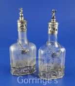 A pair of late 19th/early 20th century continental pierced repousse silver mounted etched glass