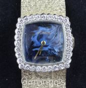 A lady's 14ct gold, lapis lazuli and diamond Jaeger Le Coultre manual wind wrist watch, with blind