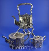 A late 19th/early 20th century Chinese export silver three piece tea set by Hung Chong & Co,