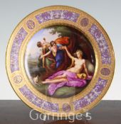 A Vienna porcelain mythological plate, c.1805, painted to the centre with the reclining semi-nude