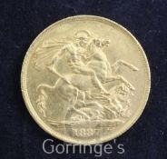 A Victoria Jubilee gold two pounds, 1887, edge scratches to reverse otherwise good VF