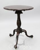 A fine Chippendale period mahogany tea table, the circular top with ribbon and foliate paterae