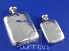 A late Victorian silver hip flask, G & J.W. Hawksley, Sheffield, 1898, 5.25in, together with a later