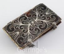 A Charles I silver and tortoiseshell prayer book cover, c.1640, decorated with stylised foliate
