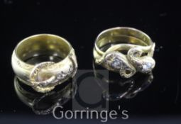 A late Victorian 18ct gold and old cut diamond set buckle ring and a similar gold twin shank