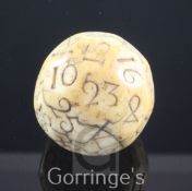 A rare English ivory Teetotum gambling ball, mid 18th century, incised with numbers 1- 32 and a