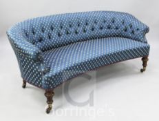 A Victorian walnut button back settee, with blue and gold fly motif upholstery, on fluted legs, W.