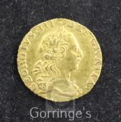 A George III gold quarter guinea, 1762, Good VF