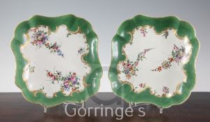 A pair of Worcester square dessert dishes, c.1780, each profusely painted with floral bouquets