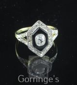 A 1930's/1940's French Art Deco 18ct gold, onyx and diamond ring, of hexagonal form, with central