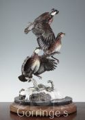 Frank Divita (b.1949) "Winter Covey". A cold painted bronze group of partridges taking flight,