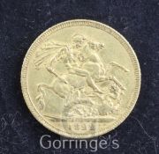 A George IV gold sovereign, 1822, Good VF, toned