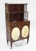 A Regency mahogany chiffonier, with two open shelves fitted with lattice brass gallery and side