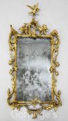 A George III Chippendale style carved and giltwood wall mirror, in the manner of Mathias Lock,