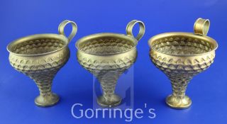 A set of three 1960's ancient Greek revival 900 standard silver gilt cups by Ilias Lalaounis, of