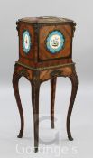 A 19th century French ormolu mounted tulipwood and kingwood bijouterie cabinet, inset with five