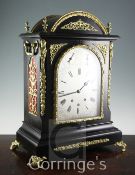 A Victorian style brass mounted ebonised chiming bracket clock, of architectural form, the arched