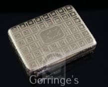 A George III bright cut engraved 18ct gold rectangular snuff box, decorated with panels of flower