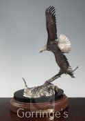 Frank DiVita (b.1949) "Spirit of the Wind". A cold painted bronze group of a bald eagle in flight,