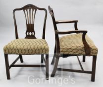 A set of eight George III Hepplewhite style mahogany dining chairs, including two carvers, with