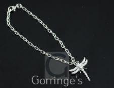 A Tiffany & Co platinum and diamond set single dragonfly charm bracelet, gross weight 8.7 grams,