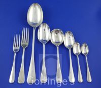 A George V part suite of silver Hanoverian rat-tail pattern flatware by Francis Stebbings, with