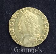 A George II gold half guinea, 1756, Old Head, scratch to bust otherwise good VF,