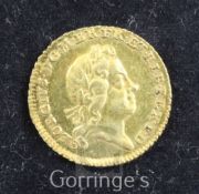 A George I gold quarter guinea, 1718, Good VF, toned