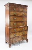 A George III mahogany chest on chest with moulded cornice, two short and six graduated long drawers,