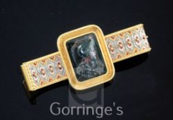 A Victorian gold, polychrome enamel and bloodstone cameo bar brooch, in the manner of Giuliano, with