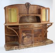 A Louis Majorelle 'Chicoree' pattern walnut and marquetry buffet, the raised back with two
