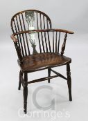 An early 19th century yew, elm and ash Windsor chair, with pierced splat, H.2ft 10in.