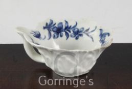 A rare Worcester Butter Boat Formal Rose pattern blue and white butter boat, c.1760-5, with leaf