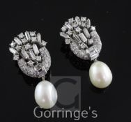 A pair of white gold, diamond and cultured pearl drop ear clips, of U form with fan shaped