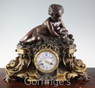 Joseph Silvani of Paris. A mid 19th century French bronze and ormolu mantel clock, surmounted with a