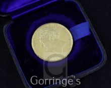 A George IV gold two pounds, 1823, bare head left, occasional hairlines and edge nicks otherwise