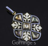 An attractive late Victorian gold, enamel and gem set pendant in the manner of Giuliano, of