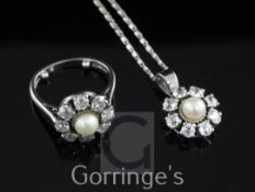 An early 1980's 18ct white gold split cultured pearl and diamond cluster ring and a similar pendant,