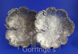 A good pair of Victorian silver dishes by John Samuel Hunt, each modelled and decorated as a leaf,