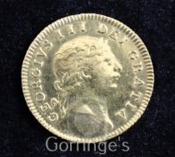 A George III gold half guinea, 1804 seventh head, good VF