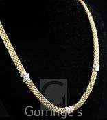 A stylish Italian 18ct gold and diamond necklace by Fope, of tubular brick link design, with three
