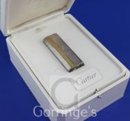 A 1970's Must de Cartier parcel gilt silver limited edition commemorative QEII Silver Jubilee gas
