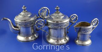 A good early 20th century Russian 84 zolotnik silver three piece tea set by Ivan Khlebnikov, Moscow,